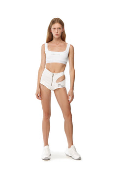 White denim shorts with cut
