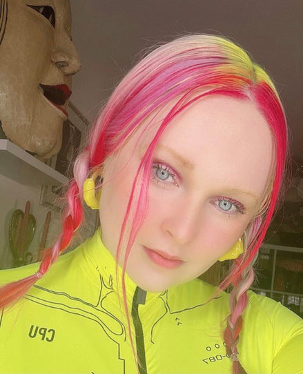 kristenvbateman in neon bodysuit