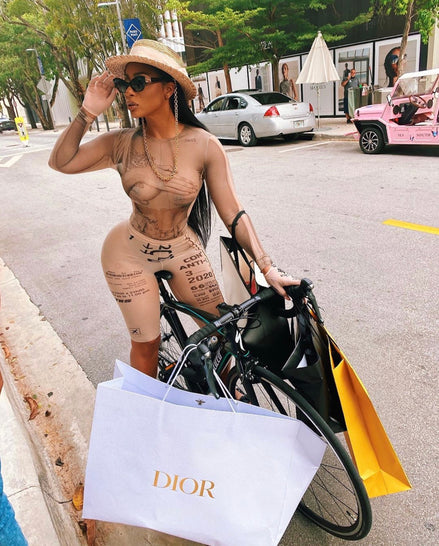 Tommie celebrated birthday in TTSWTRS mesh bodysuit "Collage" and cycling shorts from SS20